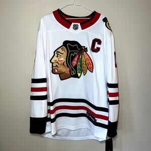 Jonathan Toews Men's Large Chicago Blackhawks Hockey Jersey